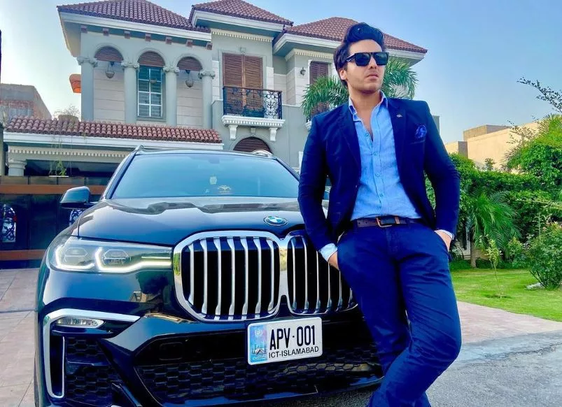 Ahsan Khan Pic with Super car BMW