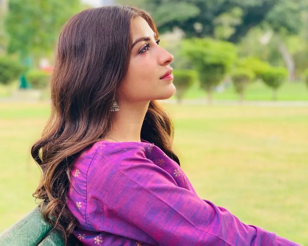 Kinza Hashmi pic in purple dress, Behind the Scenes: Kinza Hashmi's First Drama Salary Exposed!